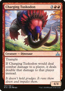 Charging Tuskodon [Rivals of Ixalan] Foil